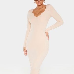 I am selling a Nude Row Edge dress